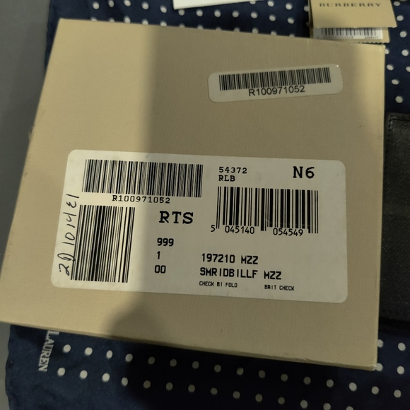 Used Burberry Wallet With all tags and box. - Picture 11 of 15
